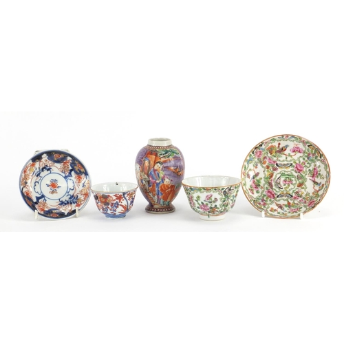 409 - Chinese porcelain including a Cantonese tea bowl with saucer and a mandarin palette vase, the larges... 