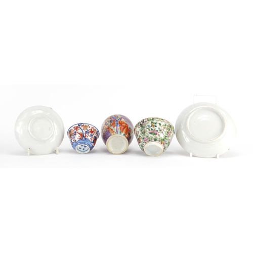 409 - Chinese porcelain including a Cantonese tea bowl with saucer and a mandarin palette vase, the larges... 