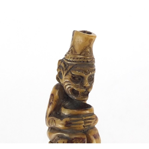 109 - Ivory tooth carved with a monkey, 8cm in length