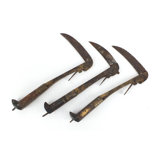 592 - Three Afghan folding Lohar knives with bone handless, 32cm in length when open