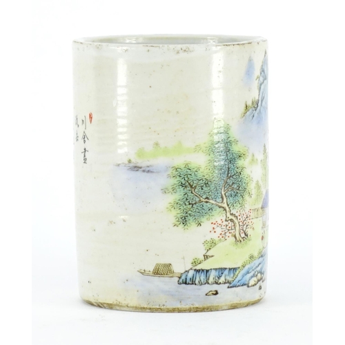 389 - Chinese porcelain cylindrical brush pot, decorated with a river landscape, calligraphy to the revers... 