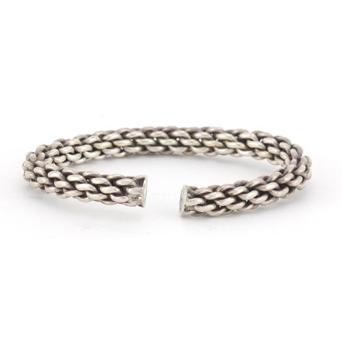 479 - Chinese silver rope design bangle, impressed character marks to each end, 8.5cm wide, 65.8g