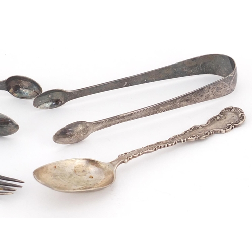 831 - Georgian and later silver flatware comprising two pairs of sugar tongs and a Christening fork and sp... 
