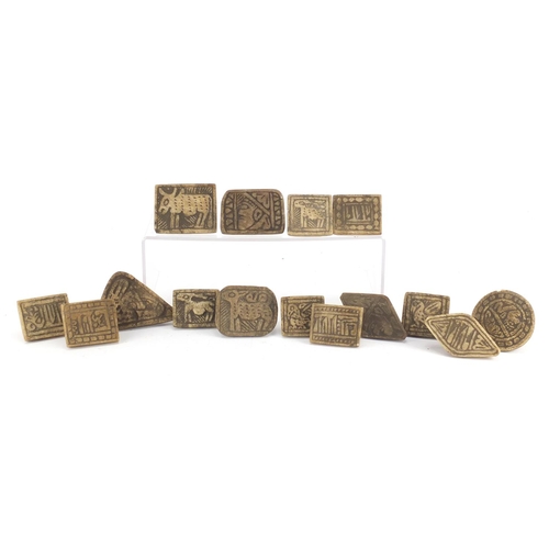 532 - Fifteen Islamic stone seals mostly carved with animals, the largest 10cm wide