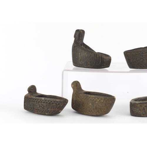 531 - Five Islamic carved stone bird design oil lamps and one other, the largest 17cm in length