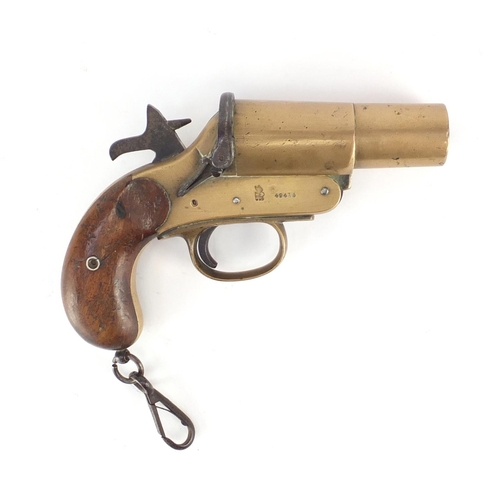 329 - ** WITHDRAWN FROM SALE ** Webley & Scott flare gun with wooden grip, various impressed marks and num... 