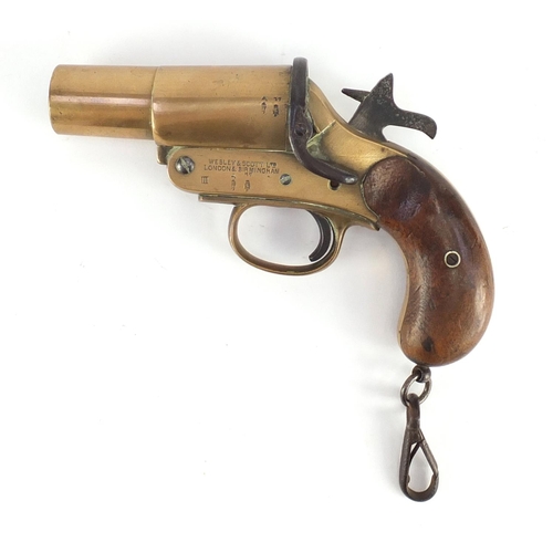 329 - ** WITHDRAWN FROM SALE ** Webley & Scott flare gun with wooden grip, various impressed marks and num... 