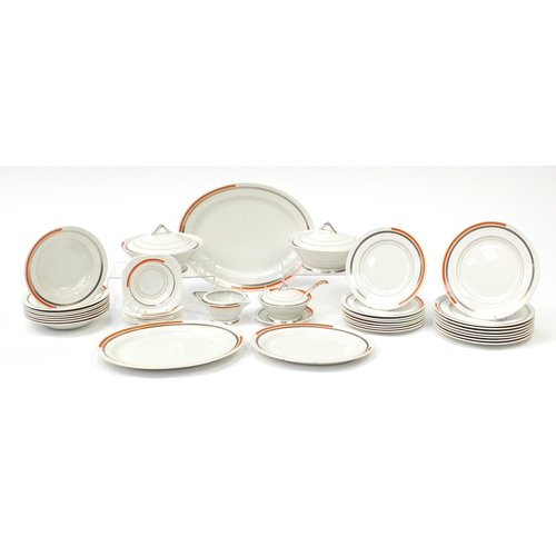 703 - Art Deco Shelley Eve dinner service including graduated set of platters, two lidded tureens and a li... 