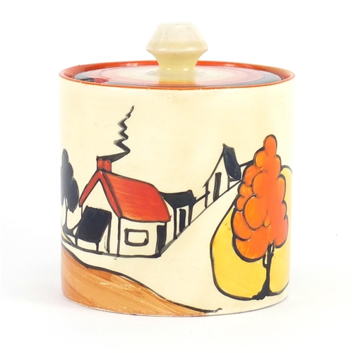 693 - Clarice Cliff Bizarre jam pot and cover, hand painted in the House and Bridge pattern, factory marks... 