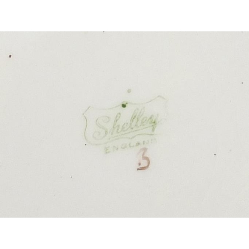 704 - Art Deco Shelley Harmony wall plaque having a green glaze, 36.5cm in diameter