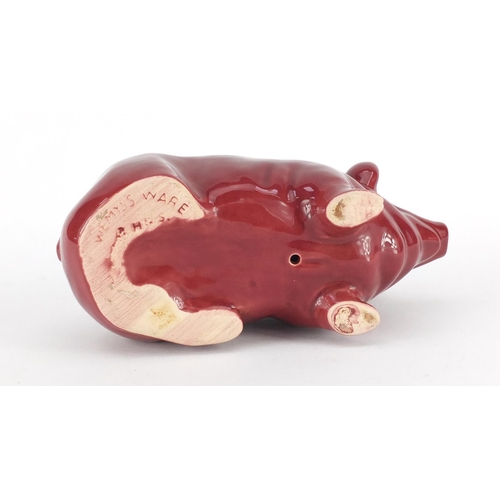 625 - Wemyss Ware pink glazed pottery pig, impressed marks to the base, 18cm in length