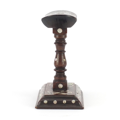 473 - Chinese carved hardwood headrest, inset with mother of pearl, 15cm high