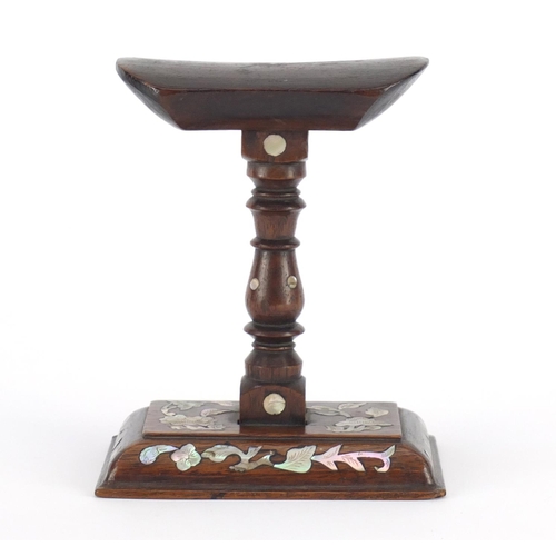 473 - Chinese carved hardwood headrest, inset with mother of pearl, 15cm high