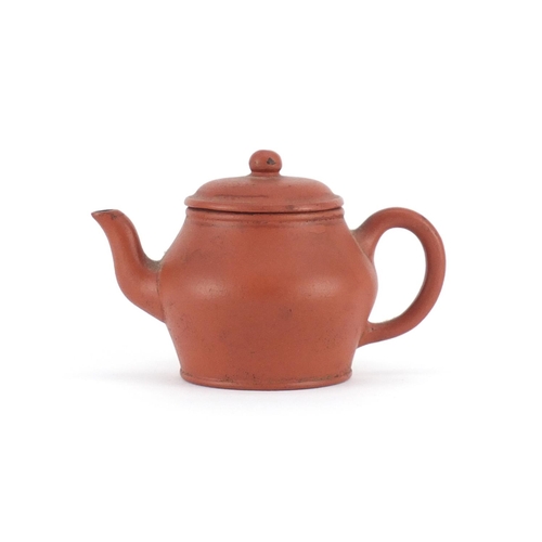 440 - Chinese yixing terracotta teapot, six figure impressed character marks to the base, 7.5cm high