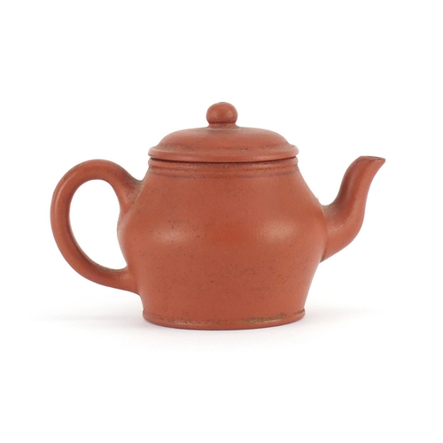 440 - Chinese yixing terracotta teapot, six figure impressed character marks to the base, 7.5cm high