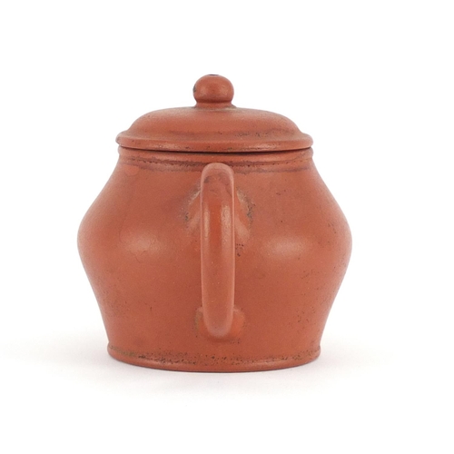 440 - Chinese yixing terracotta teapot, six figure impressed character marks to the base, 7.5cm high