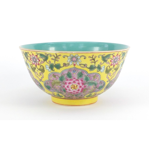 379 - Chinese porcelain yellow ground bowl, finely hand painted in the famille rose palette with chrysanth... 