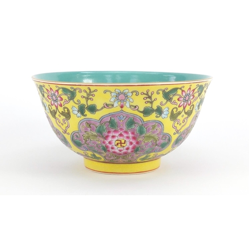 379 - Chinese porcelain yellow ground bowl, finely hand painted in the famille rose palette with chrysanth... 