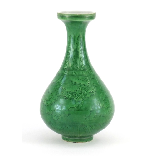 415 - Chinese porcelain green glazed disc top vase, incised under glaze with a dragon and phoenix chasing ... 