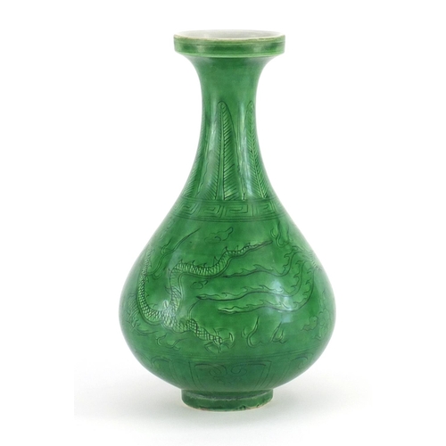 415 - Chinese porcelain green glazed disc top vase, incised under glaze with a dragon and phoenix chasing ... 