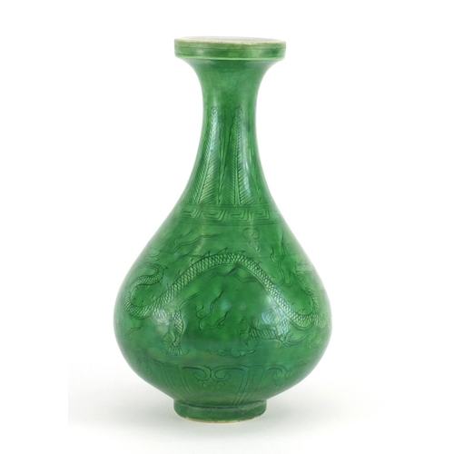 415 - Chinese porcelain green glazed disc top vase, incised under glaze with a dragon and phoenix chasing ... 