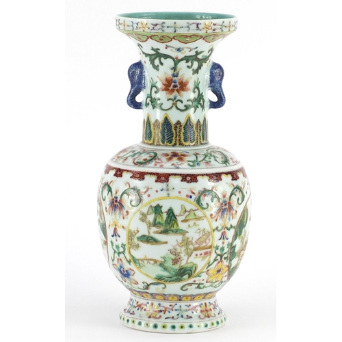 369 - Chinese porcelain vase with elephant head handles, finely hand painted in the famille rose palette w... 