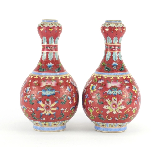 367 - Pair of Chinese porcelain garlic neck vases, each finely hand painted in the famille rose palette wi... 