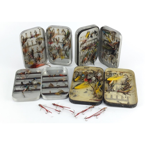 118 - Collection of vintage hand tied fishing flies, housed in three Wheatley alloy cases and one other