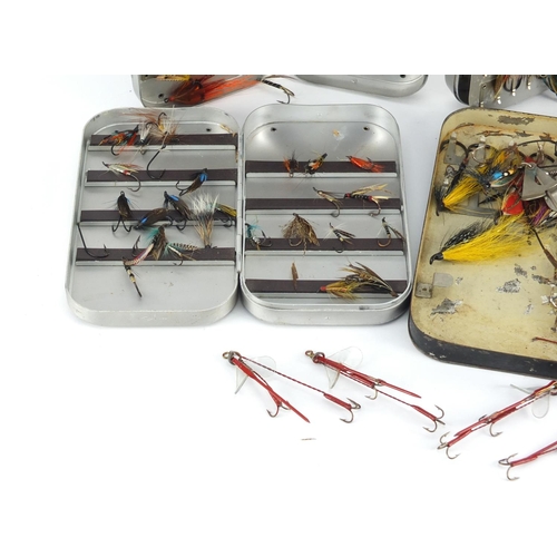 118 - Collection of vintage hand tied fishing flies, housed in three Wheatley alloy cases and one other