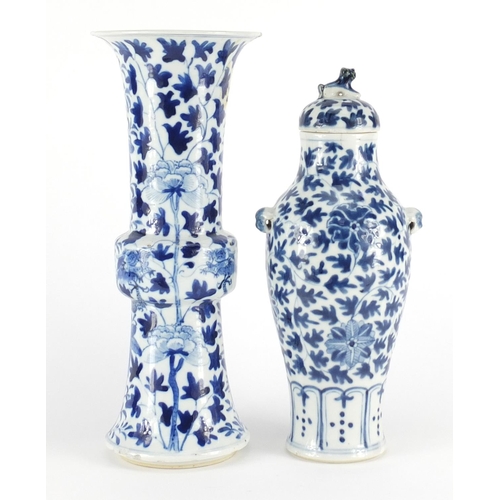 346 - Two Chinese blue and white porcelain vases comprising a Gu vase hand painted with dragons and a balu... 