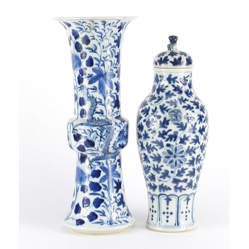 346 - Two Chinese blue and white porcelain vases comprising a Gu vase hand painted with dragons and a balu... 