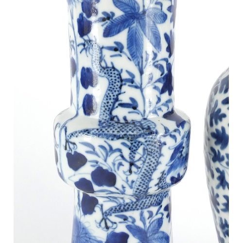346 - Two Chinese blue and white porcelain vases comprising a Gu vase hand painted with dragons and a balu... 