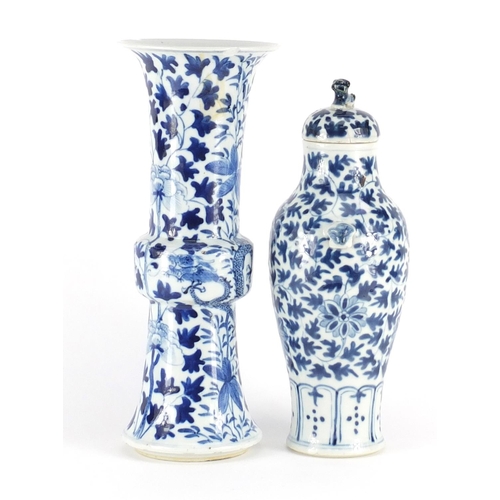 346 - Two Chinese blue and white porcelain vases comprising a Gu vase hand painted with dragons and a balu... 