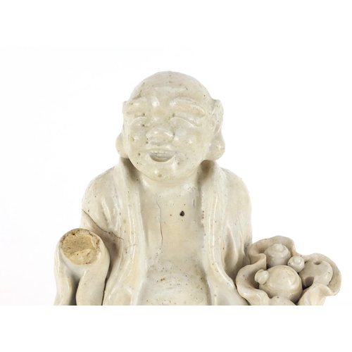 436 - Chinese Blanc de Chine porcelain figure of a  monk, 25cm high