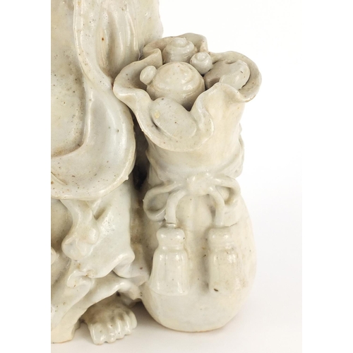 436 - Chinese Blanc de Chine porcelain figure of a  monk, 25cm high