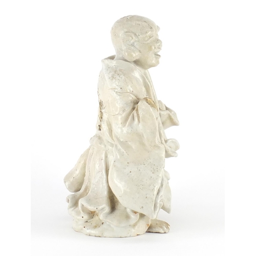 436 - Chinese Blanc de Chine porcelain figure of a  monk, 25cm high