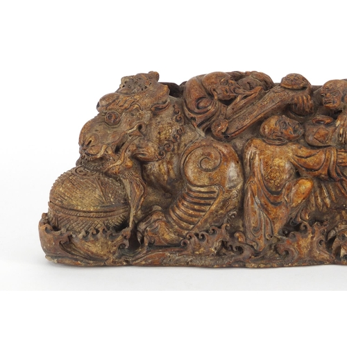 496 - Chinese russet soapstone carving of a dragon with figures, 22cm wide