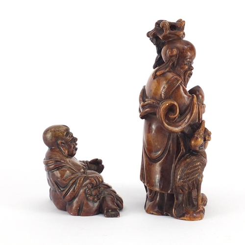 495 - Two Chinese russet soapstone carvings including one of an elder, character marks to the base, the la... 