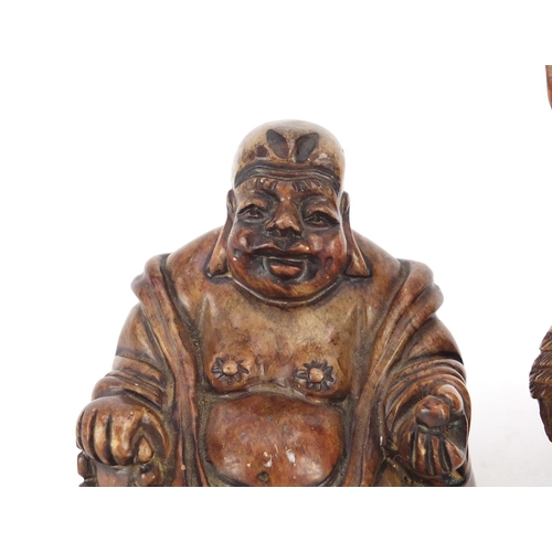 495 - Two Chinese russet soapstone carvings including one of an elder, character marks to the base, the la... 