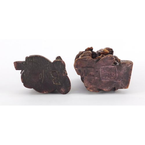 495 - Two Chinese russet soapstone carvings including one of an elder, character marks to the base, the la... 