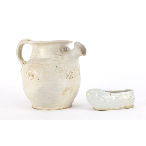 421A - Chinese celadon glazed slipper and a white glazed jug, the largest 11cm high