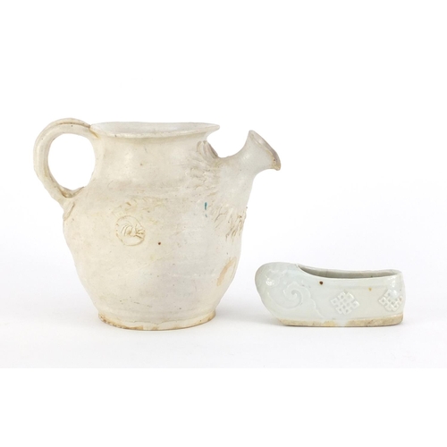 421A - Chinese celadon glazed slipper and a white glazed jug, the largest 11cm high