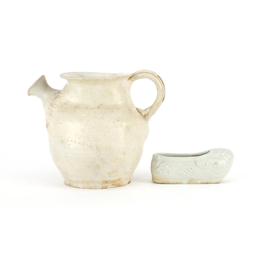 421A - Chinese celadon glazed slipper and a white glazed jug, the largest 11cm high