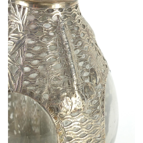 478 - Chinese four chamber glass decanter with sterling silver overlay, pierced and embossed with dragons ... 