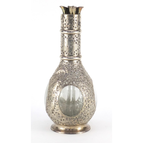 478 - Chinese four chamber glass decanter with sterling silver overlay, pierced and embossed with dragons ... 