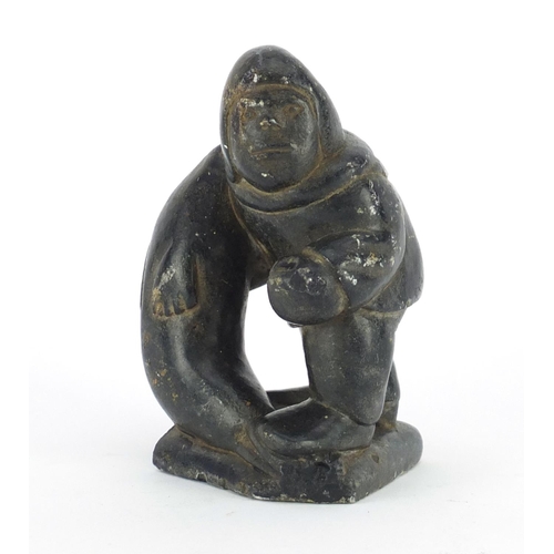 539 - Inuit stone carving of a fisherman by Thomassie Tookalook, incised marks to the base, 12.5cm high