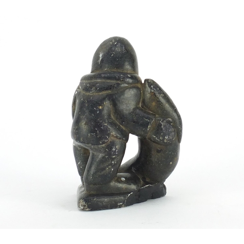 539 - Inuit stone carving of a fisherman by Thomassie Tookalook, incised marks to the base, 12.5cm high