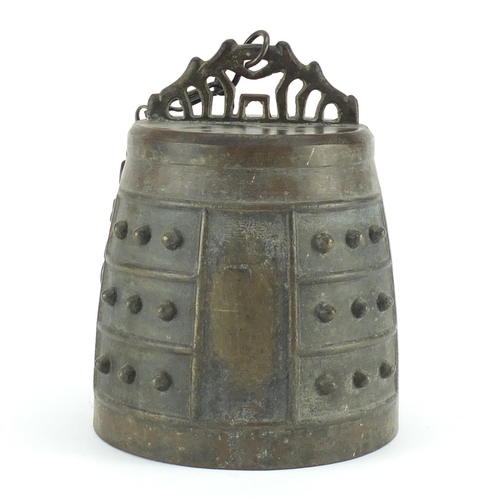 468 - Antique Sino-Tibetan bronze temple bell on later stand, overall 64cm high, the bell 22cm high