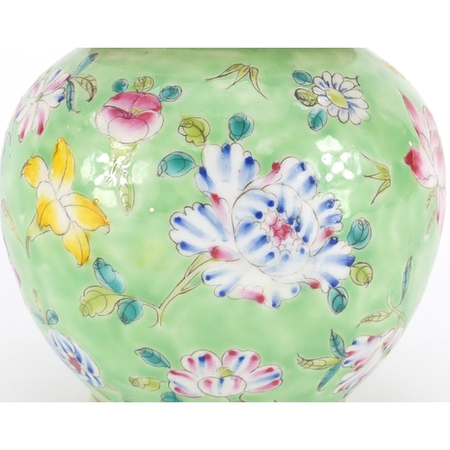 395 - Chinese porcelain lidded vase and cover, finely hand painted in the famille rose palette with flower... 