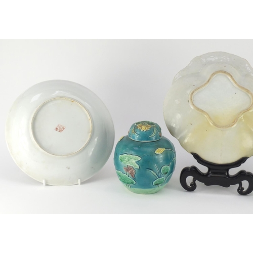 410 - Chinese porcelain including two ginger jars with covers, two One Thousand Flower famille noir dishes... 